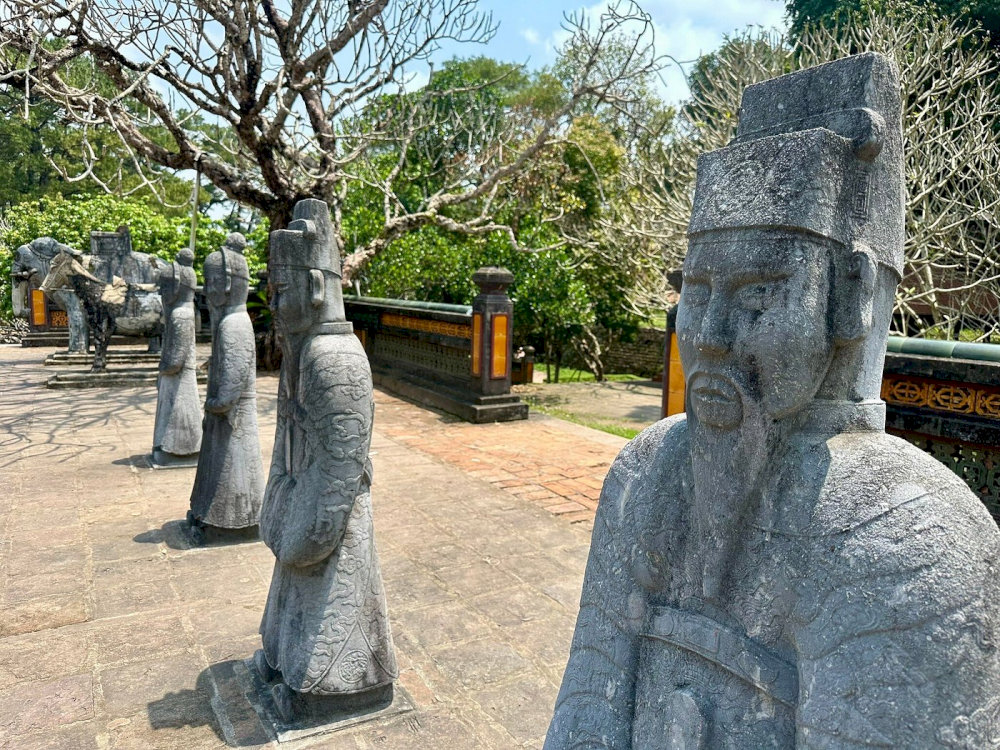 Emperor Tu Duc had the statues of mandarins erected at Bai Dinh, leading the way toward his stele and tomb 